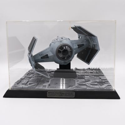 a model of a star wars tier in a display case