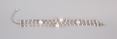 silver plated bracelet on a white background with a chain