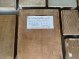 several pieces of wood are stacked on top of each other