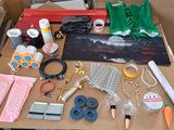 a table with a bunch of crafting supplies on it