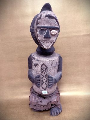an image of a statue of a man with a hat on his head
