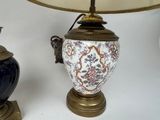 a lamp that is sitting on a table next to a lamp