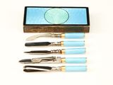 five different types of tools sitting in a box