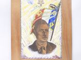 dessin représentant le portrait d'un homme tenant un drapeau, sur une plaque en bois