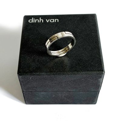 a ring that is sitting in a box on a table