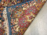 an image of a close up of a rug on a floor