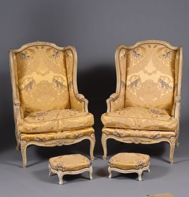 pair of louis xv style armchairs and footstools