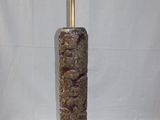 a lamp that is sitting on a table next to a lamp