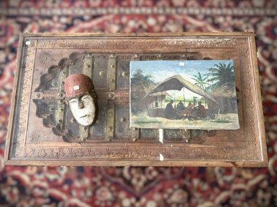 a picture of a man with a hat on and a picture of a house