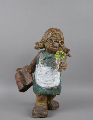 an image of a statue of a woman with a flower in her hand