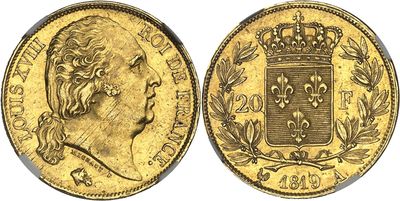 a gold sovereign coin with a crown on top of it