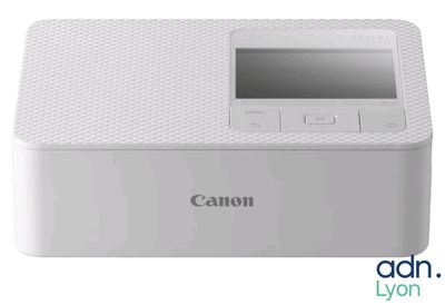 un gros plan d'une imprimante photo Canon sur fond blanc