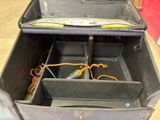 an open suitcase that is sitting on the floor