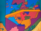 a colorful painting on the wall of a building