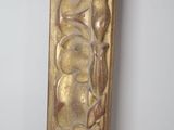 a picture of a gold frame with a design on it