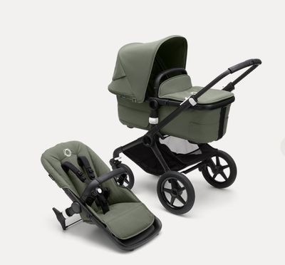 two strollers and a baby carriage on a white background