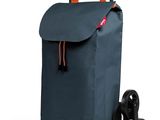 une image représentant un sac à roulettes bleu sur fond blanc