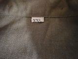 an image of a close up of a piece of clothing with a tag on it