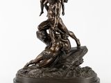 une image représentant une statue en bronze d'un homme et d'une femme