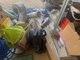 a pile of assorted items sitting on the floor