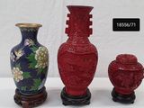 three vases sitting next to each other on a table