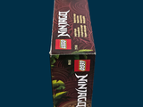 a box with a lego ninja figure inside of it