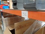 many boxes on the shelf in the warehouse