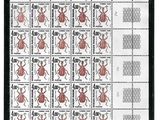 un timbre sur lequel figure l'image d'un insecte
