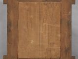 an old wooden easel with a piece of wood on top of it