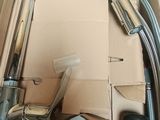 a box that has a sink and a faucet in it