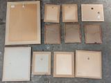 many pieces of cardboard on the floor next to each other