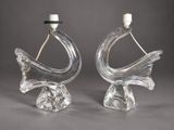 pair of clear glass swan lamps with white candlesticks