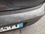 a close up of a bmw logo on the front of a car