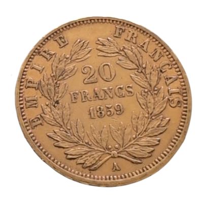 un gros plan d'une pièce de monnaie sur laquelle figure une couronne