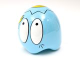 a blue piggy bank with two eyes and a yellow top