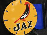 a clock with a bird on it and the word jazz on it