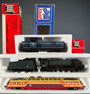 a toy train that is sitting on top of a shelf