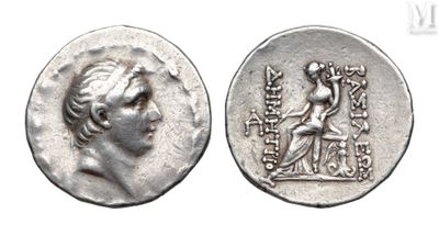 a close up of a coin with an image of a woman on it