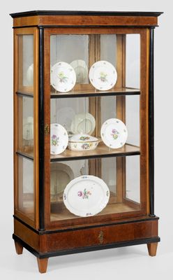 a display case with a lot of plates in it