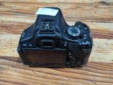 a camera that is sitting on a wooden table