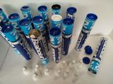 a lot of blue and white tubes and a bottle of water