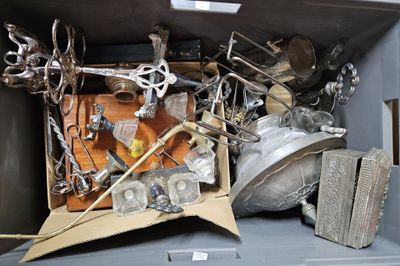 a box full of silver items that are in it