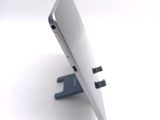 a close up picture of a laptop computer on a stand