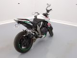 a motorcycle that is sitting on the floor in a room