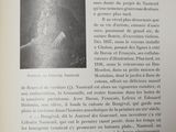 an open book with a picture of a woman in a white dress