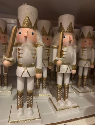 a lot of nutcrackers on display in a store