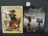 deux livres posés sur une table noire, avec la photo d'un homme à cheval