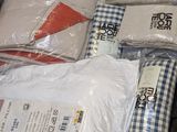 many items that are packed in a cart on the floor