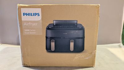 une boîte sur laquelle figure l'image d'une friteuse à air chaud