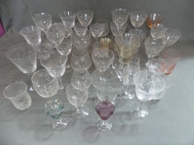 a lot of wine glasses sitting on a table
